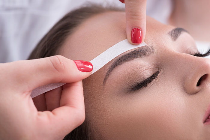 What is eyebrow waxing?